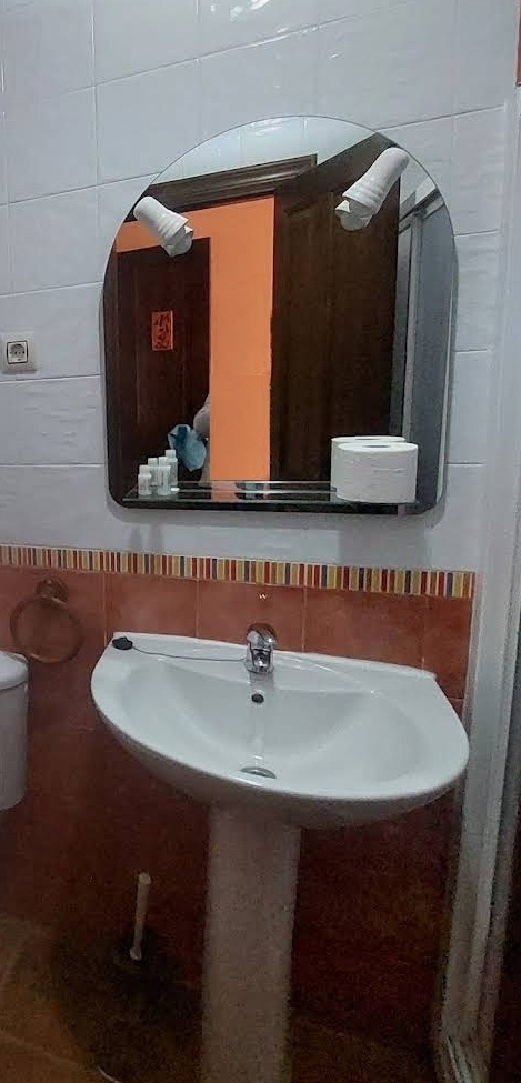 Baño naranja sección